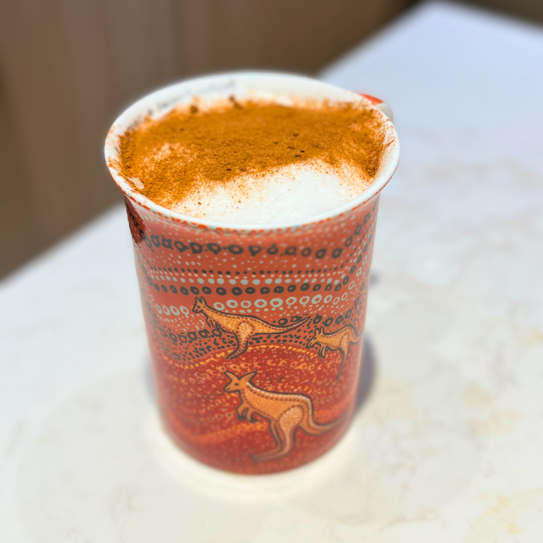 Cappuccino with a sprinkle of cinnamon