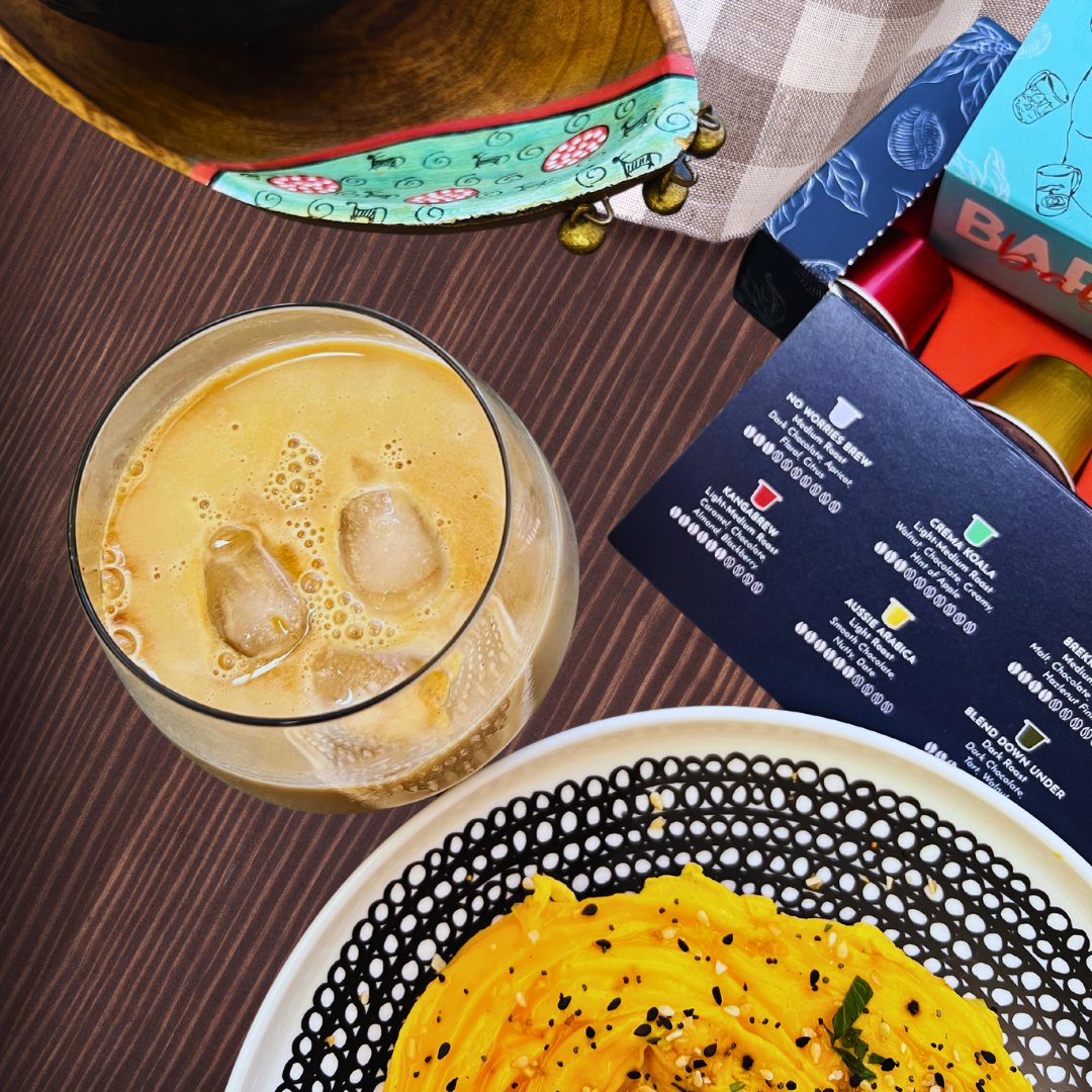 Coffee with breakfast and a box of Barista Baba Coffee Capsules